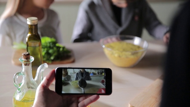 Video Reference: Food, Tableware, Mixing bowl, Recipe, Bottle, Gesture, Yellow, Ingredient, Mobile phone, Kitchen utensil