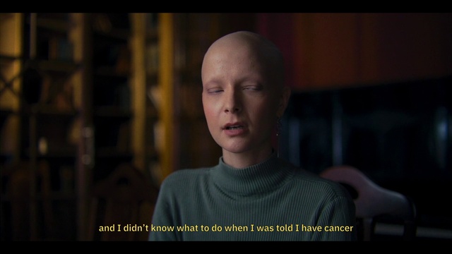 Video Reference: Flash photography, Jaw, T-shirt, Darkness, Font, Screenshot, Portrait photography, Portrait, Photo caption