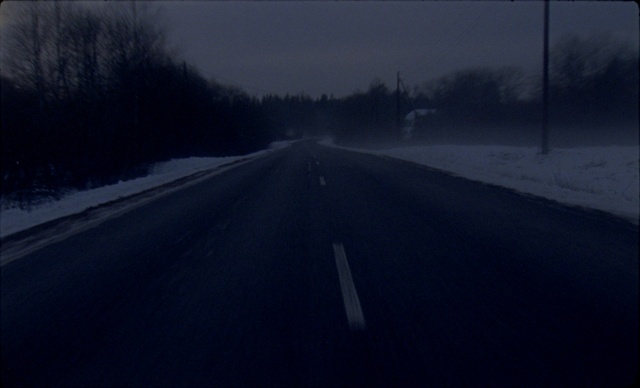 Video Reference: Sky, Road surface, Asphalt, Natural landscape, Mode of transport, Grey, Cloud, Fog, Thoroughfare, Tree