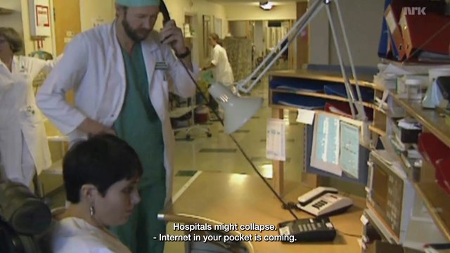 Video Reference: hospital, ward, doctors, nurses, medical staff, clinic, interior, desk, telephone, equipment, corridor, subtitles, broadcast, watermark