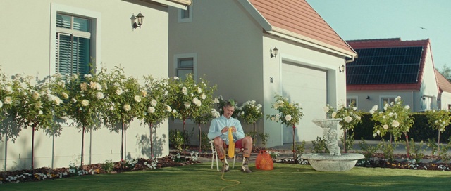 Video Reference: Flower, Plant, Building, Property, Window, Flowerpot, Leaf, House, Grass, Chair