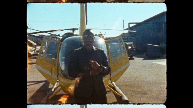 Video Reference: Sky, Aircraft, Mode of transport, Automotive mirror, Travel, Motor vehicle, Jacket, Tints and shades, Aviation, Helicopter