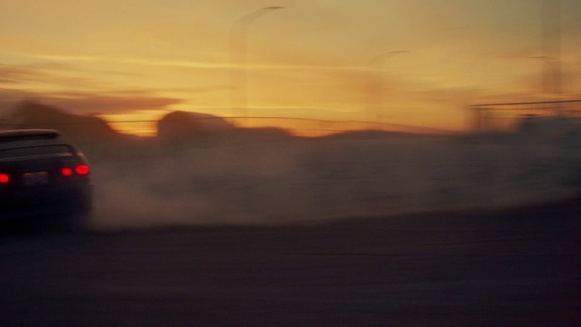 Video Reference: Cloud, Sky, Atmosphere, Hood, Car, Automotive mirror, Afterglow, Dusk, Vehicle, Automotive tire