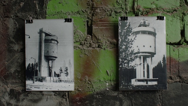 Video Reference: Green, Building, Art, Font, Facade, Grass, Tower, Visual arts, Graffiti, Landscape