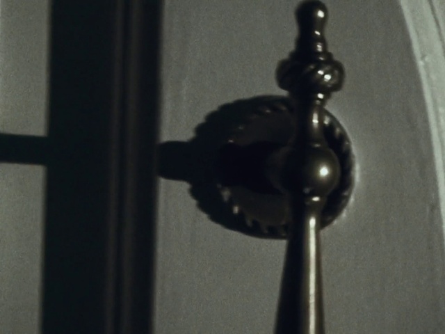 Video Reference: Grey, Material property, Audio equipment, Tints and shades, Gas, Metal, Door, Circle, Darkness, Fashion accessory