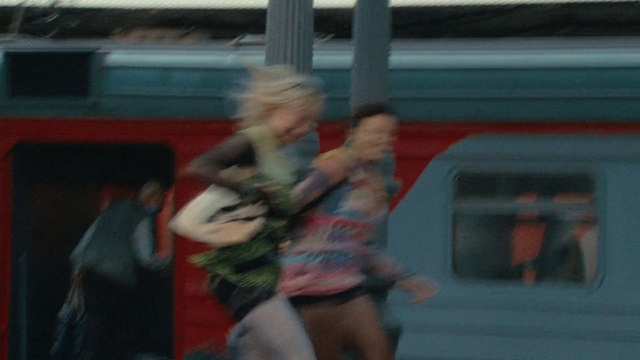 Video Reference: Train, Shorts, Vehicle door, Public transport, Passenger car, Event, Human leg, Automotive exterior, Recreation, Rolling stock