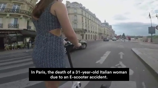 Video Reference: Cloud, Building, Sky, Sleeve, Waist, Gesture, Asphalt, Car, Automotive tire, Travel