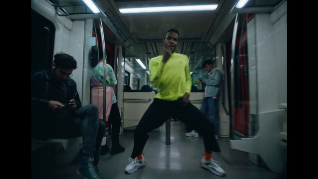Video Reference: Footwear, Shoe, Shorts, Mode of transport, Sneakers, Public transport, Automotive design, Passenger, Vehicle door, Bag