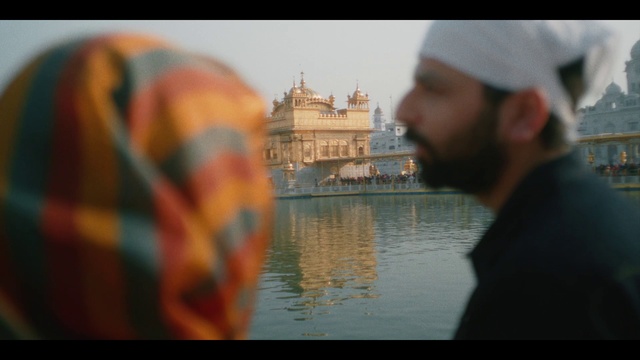 Video Reference: Water, Building, Sky, Body of water, Lake, Travel, People, Tints and shades, Happy, Cap