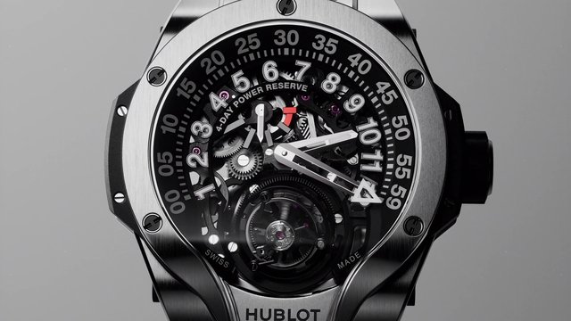 Video Reference: watch, wristwatch, luxury, skeleton dial, close-up, metal case, gears, mechanical, chronograph, black dial, white numerals, timepiece, horology, gray background
