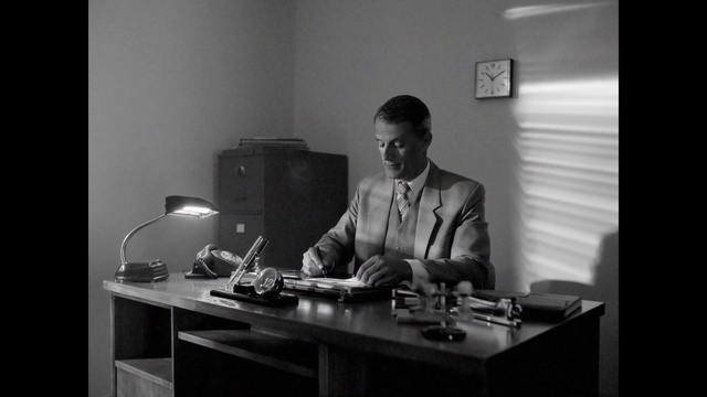 Video Reference: Table, Furniture, Desk, Black, Microphone, Clock, Writing desk, Monochrome, White-collar worker, Monochrome photography