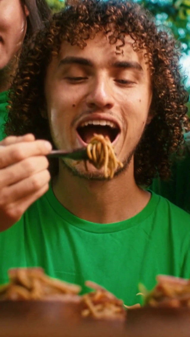 Video Reference: Hair, Food, Chin, Hairstyle, Mouth, Green, Organ, Jaw, Food craving, Happy