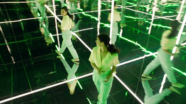 Video Reference: Trousers, Green, Line, Performing arts, Entertainment, Terrestrial plant, Leisure, Fun, Event, Tree