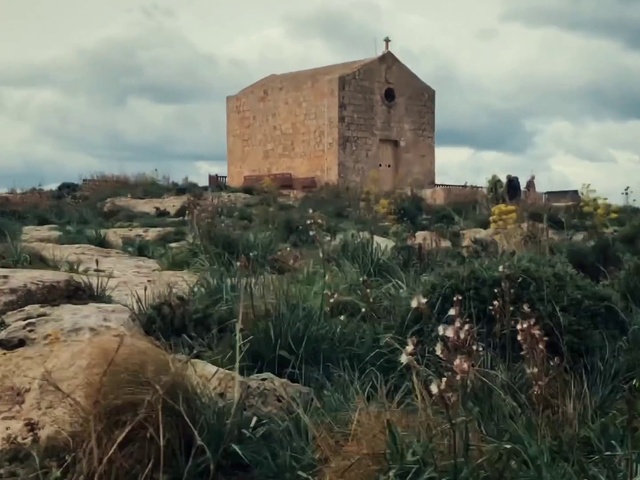 Video Reference: Sky, Cloud, Plant, Ecoregion, Highland, Land lot, Grass, Natural landscape, Building, Landscape