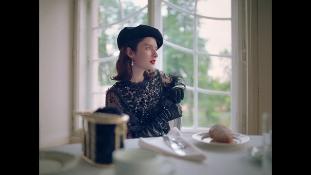 Video Reference: Face, Hat, Window, Sleeve, Flash photography, Standing, Tableware, Table, Fashion design, Waist
