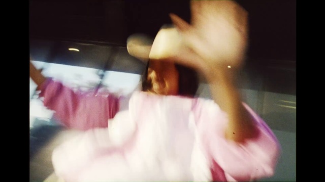 Video Reference: Gesture, Eyelash, Flash photography, Magenta, Human leg, Event, Thumb, Wrist, Petal, Elbow
