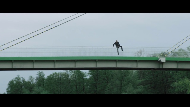 Video Reference: Sky, Tree, Bridge, Rectangle, Road, Electricity, Girder bridge, City, Overhead power line, Overpass