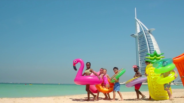 Video Reference: Sky, Building, Water, People on beach, Skyscraper, Beach, People in nature, Happy, Travel, Leisure