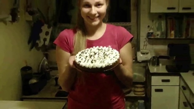 Video Reference: Food, Smile, Shoulder, Furniture, Tableware, Cabinetry, Cake decorating, Chair, Cake, Plate