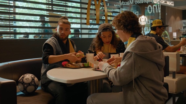 Video Reference: Table, Comfort, Hat, Event, Houseplant, Eyewear, Job, Conversation, Leisure, Sitting