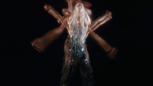 Video Reference: Water, Dress, Musician, Thigh, Artist, Entertainment, Performing arts, Music, Flash photography, Dance