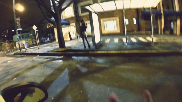 Video Reference: Light, Street light, Window, Road surface, Mode of transport, Asphalt, Building, Wood, Floor, Public space