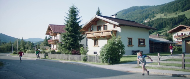Video Reference: Plant, Building, Sky, Window, Tree, House, Land lot, Mountain, Asphalt, Neighbourhood