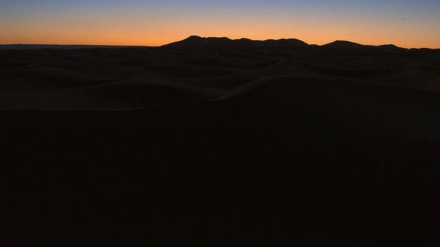 Video Reference: Sky, Mountain, Highland, Natural landscape, Terrain, Cloud, Slope, Mountainous landforms, Dusk, Grassland