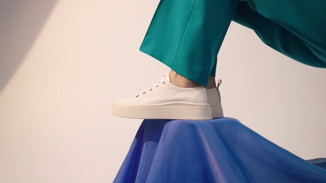 Video Reference: Dress, Azure, Neck, Textile, Sleeve, Waist, Gesture, Knee, Sportswear, T-shirt