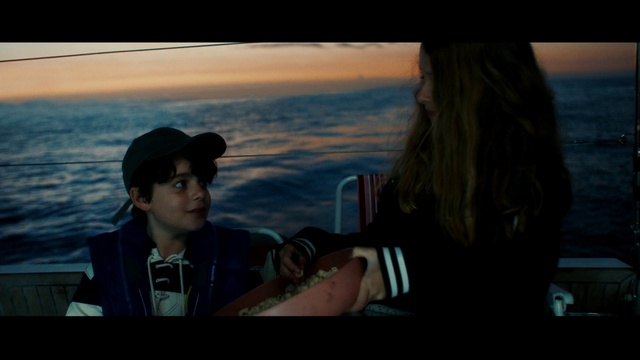 Video Reference: Hat, Flash photography, Sky, Gesture, Travel, Body of water, Cap, Happy, Baseball cap, Horizon