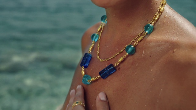 Video Reference: Water, Body jewelry, Neck, Sunglasses, Finger, Necklace, Chest, Eyewear, Wrist, Trunk