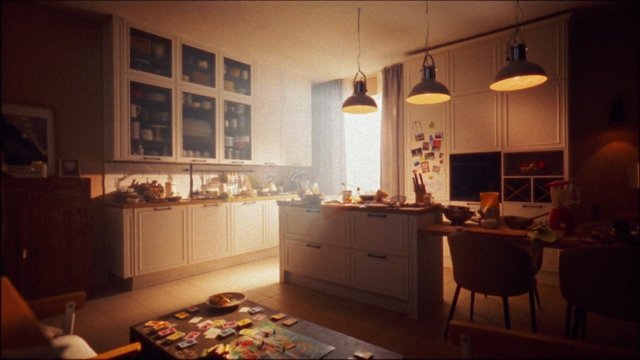 Video Reference: kitchen, interior, home, modern, warm lighting, cabinetry, island, pendant lights, countertop, dining area, cluttered, residential, indoor, evening, cozy