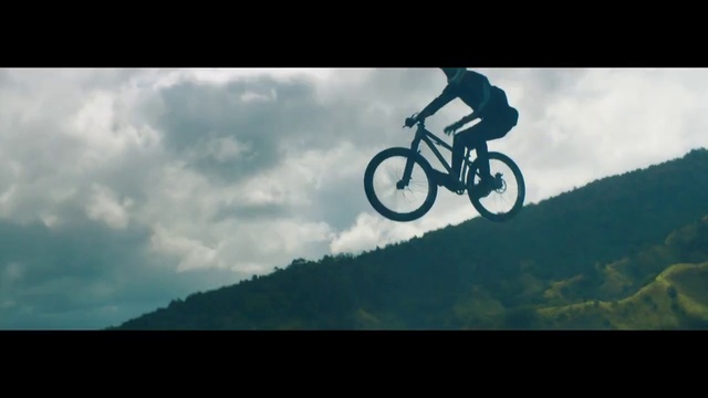 Video Reference: Bicycle, Footwear, Cloud, Tire, Wheel, Sky, Bicycle wheel, Bicycle frame, Bicycle tire, Bicycle handlebar