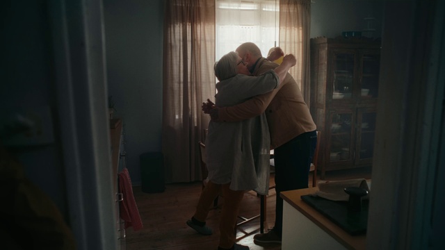 Video Reference: Curtain, Standing, Window, Gesture, Interior design, Wood, Flooring, Event, Hardwood, Window treatment