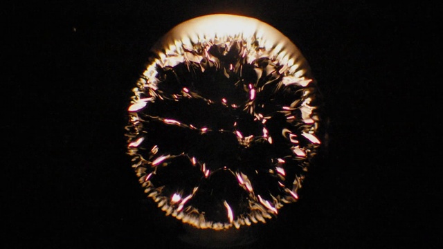 Video Reference: Fireworks, Event, Circle, Midnight, Darkness, Recreation, Holiday, New year, Electric blue, Heat