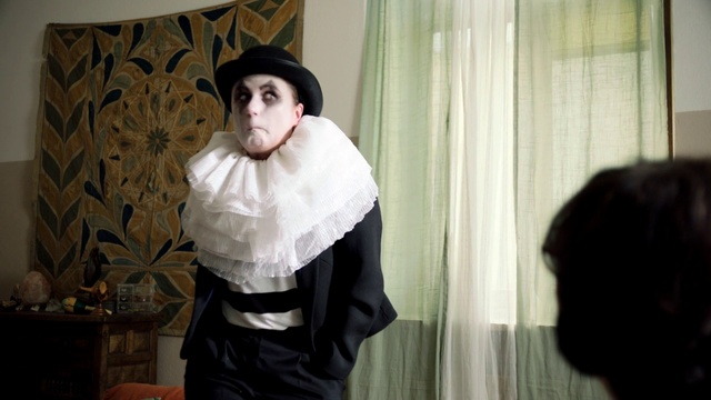 Video Reference: Sleeve, Gesture, Flowerpot, Curtain, Houseplant, Event, Formal wear, Shawl, Fur, Fun