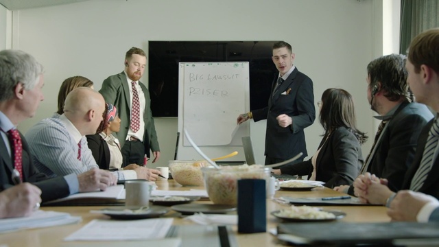 Video Reference: Table, Coat, Tableware, Whiteboard, Event, Service, Suit, Job, Desk, White-collar worker