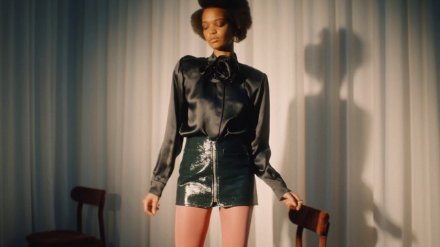Video Reference: Sleeve, Thigh, Waist, Hat, Flash photography, Fashion design, Black hair, Fashion model, Blazer, Shorts