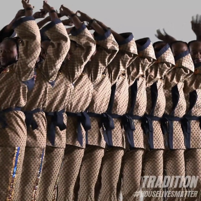 Video Reference: Wood, Headgear, Font, Roof, Metal, Pattern, Automotive tire, Symmetry, Natural material, Hat