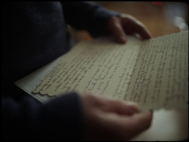 Video Reference: Handwriting, Finger, Font, Writing instrument accessory, Writing, Gesture, Paper, Office supplies, Nail, Darkness