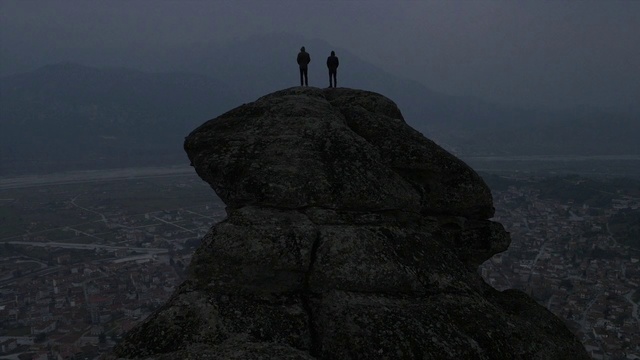 Video Reference: Sky, Bedrock, Mountain, Terrain, Mountainous landforms, Landscape, Formation, Outcrop, Fog, Mountain range