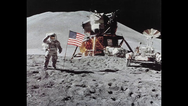 Video Reference: Astronaut, World, Flag, Astronomical object, Space, Moon, Landscape, Art, Event, Astronomer