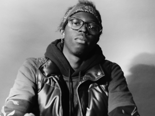 Video Reference: Glasses, Outerwear, Flash photography, Vision care, Sleeve, Gesture, Happy, Collar, Smile, Eyewear