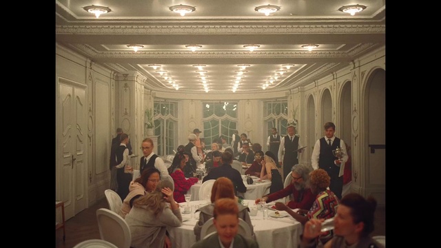 Video Reference: Furniture, Photograph, Table, Chair, Lighting, Interior design, Social group, Suit, Crowd, Event