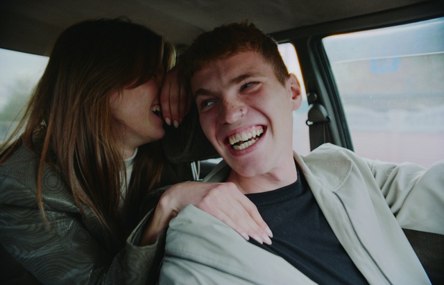Video Reference: Hair, Smile, Skin, Facial expression, Car, Mouth, Flash photography, Gesture, Happy, Motor vehicle