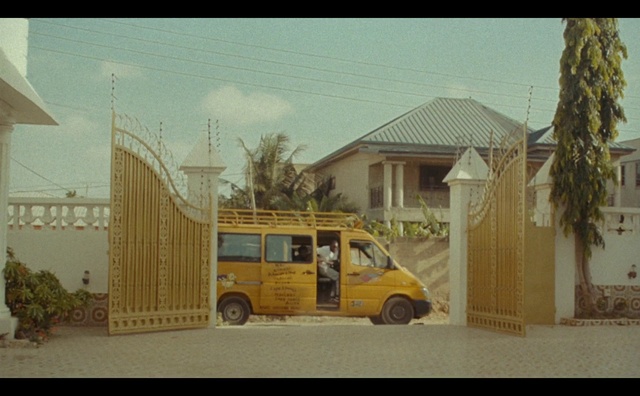 Video Reference: Wheel, Tire, Building, Vehicle, Car, Motor vehicle, Window, Sky, Plant, Wood