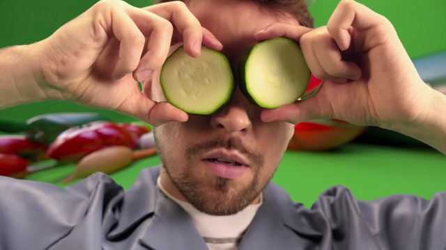 Video Reference: Hand, Food, Green, Granny smith, Mouth, Fruit, Gesture, Natural foods, Finger, Seedless fruit