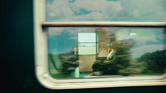 Video Reference: Cloud, Train, Window, Rectangle, Fixture, Sky, Travel, Tints and shades, Public transport, Glass