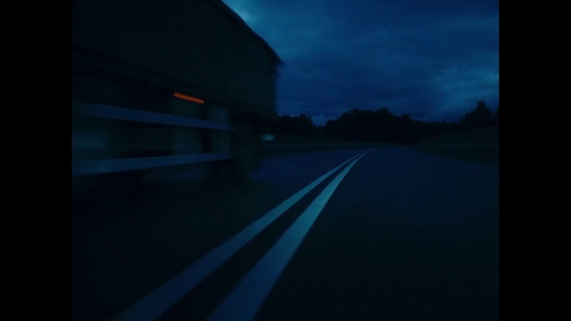 Video Reference: Sky, Rectangle, Road surface, Asphalt, Cloud, Atmospheric phenomenon, Building, Tints and shades, Road, Tree