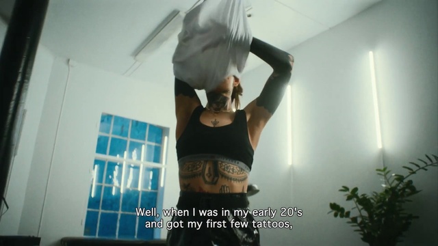 Video Reference: Flash photography, Waist, Gesture, Plant, Thigh, Sportswear, Elbow, Vest, Brassiere, T-shirt